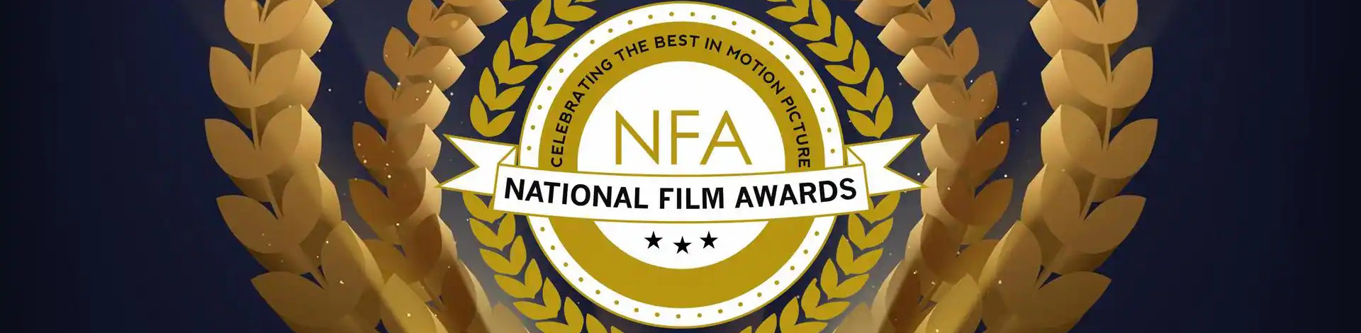 A promotional image for the National Film Awards featuring a gold laurel wreath encircling a white and gold badge with the letters “NFA” and the tagline “Celebrating the Best in Motion Picture”.